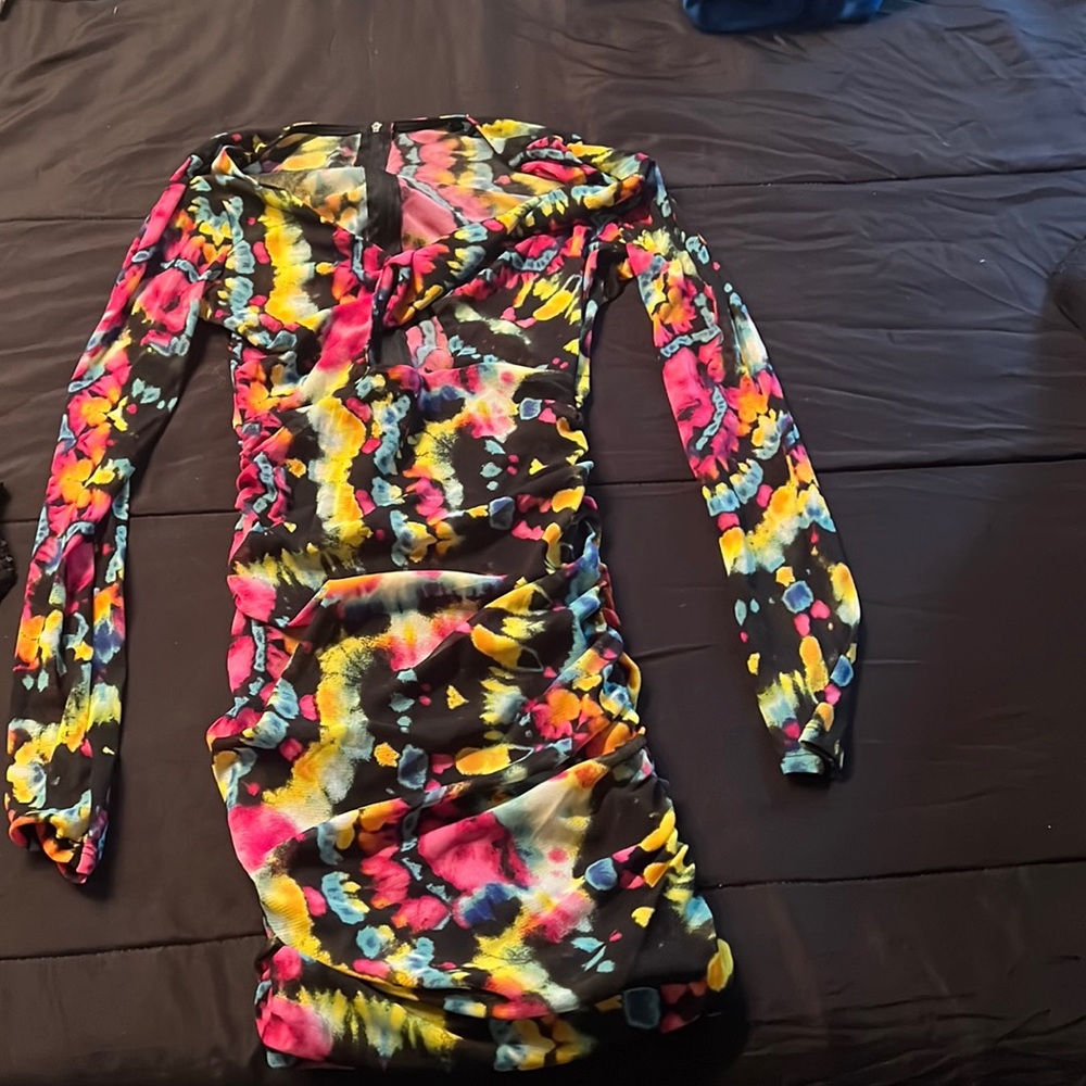 This is a colorful peek a boo ruffled dress..u can wear this for a date nite